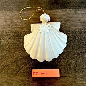 Margaret Furlong 1994 Porcelain “Sun”
Angel Christmas Ornament